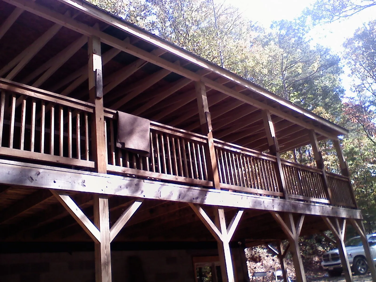 Timber framing under a new elevated porch and deck — Roof Leak Repair in Palm City by Roofing Brothers
